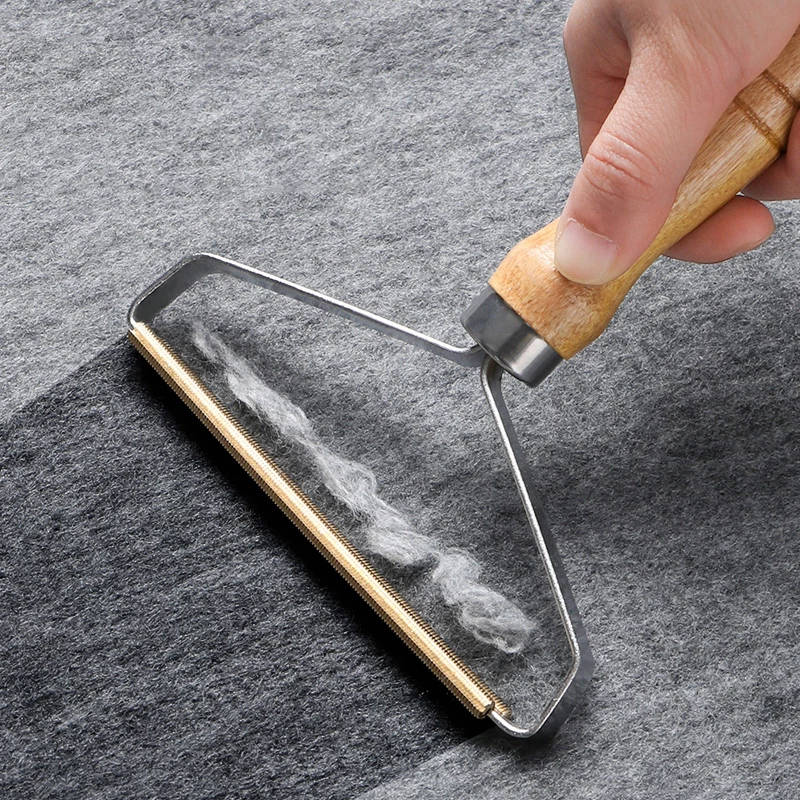Brosse portative pour épiler les poils d'animaux et rouleau à peluches